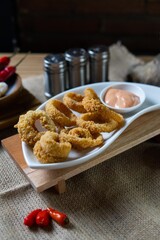 Indonesian snack appetizer deep fried tempe chicken calamari golden brown