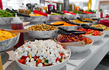 Chopped vegetables and vegetable salads. All-inclusive concept.