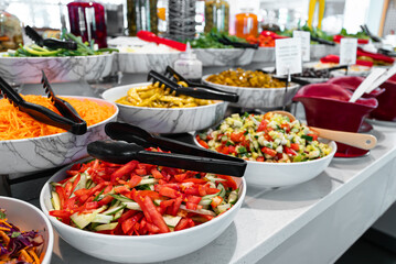 Chopped vegetables and vegetable salads. All-inclusive concept.