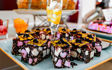 Rocky road gingerbread desert on a plate.