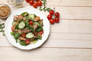 Delicious fresh tuna salad on white wooden table, flat lay. Space for text