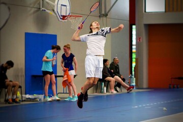 Athletic Badminton Player Executing an Incredible Jump