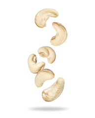  Group of tasty cashew nuts in the air close-up isolated on a white background