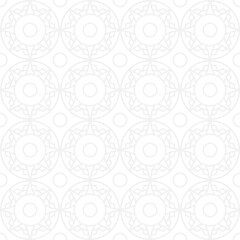Seamless trend ornament of circles and arcs, geometric white shapes for textiles and wallpaper. Abstract panoramic pattern on a gray background for a New Year or wedding cover or card.