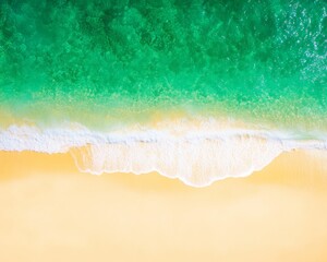 Tranquil Aerial View of Pristine Beach with Emerald Waters and Soft White Sand