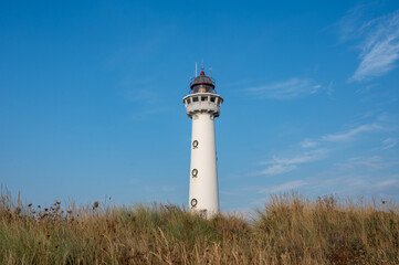 Lighthouse in the dunes of the Dutch town of Egmond aan Zee