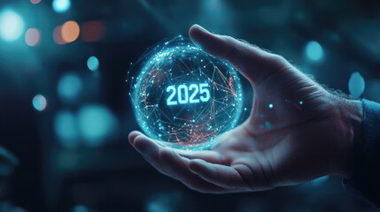 Hand holding futuristic digital sphere with 2025 for technology and innovation concept
