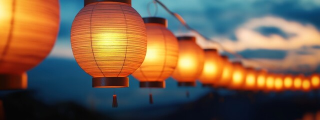 Obraz premium Illuminated Lanterns at Dusk, a serene display of glowing paper lanterns creating a warm ambiance under a starry night sky
