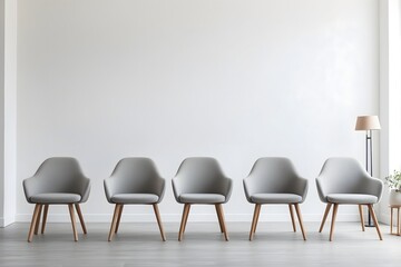 A row of simple chairs aligned against a clean, white wall, creating a minimalist and organized appearance.