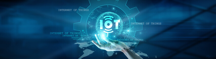 Hand holding global network connection on the Internet of Things, linking devices, data, people, and technology in a futuristic world of seamless connectivity and smart innovation.
