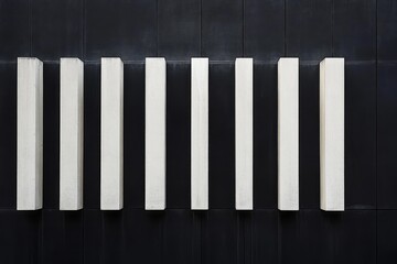 Minimalist Architectural Columns on Dark Wall