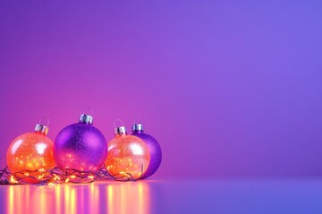 Colorful Christmas ornaments glowing in purple and orange hues, creating a festive atmosphere with soft reflections.