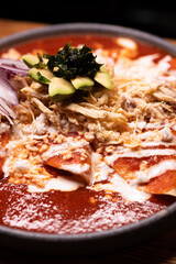 Traditional typical Mexican food, Mexican gastronomy concept. Tacos, chilaquiles, Mexican tradition.