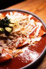 Traditional typical Mexican food, Mexican gastronomy concept. Tacos, chilaquiles, Mexican tradition.