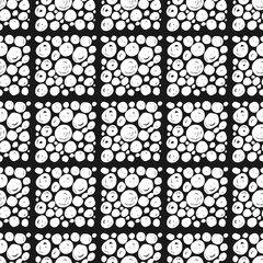 Seamless pattern with white textured squares on a black background