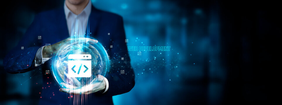 Web Development: Businessman holding innovation technology to develop smart solutions from digital interfaces, user experience, responsive design.