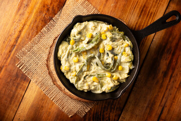 Rajas con Crema. Very popular dish in Mexico that consists of strips of poblano chili with cream, it is served as a garnish or in tacos, it is a typical recipe in Mexican Tacos de Guisado.