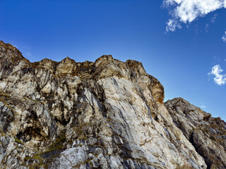 close up of rocky mountain peak under clear blue sky. Log pod Mangartom. Slovenia. Julian alps. mountain landscape. nature photography