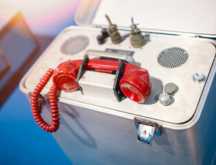 Close-Up of Vintage Military Radio Equipment with Old Phone and Cables