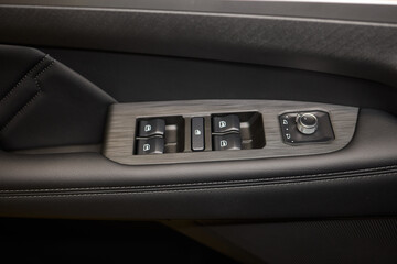 Obraz premium Modern Car Door Control Panel with Window Switches for convenience and functionality