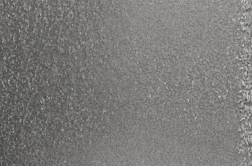 Grainy noise texture background in black, white, gray, and silver for a monochrome abstract design. Minimalist banner, poster, or header with a sleek and modern style for versatile use.