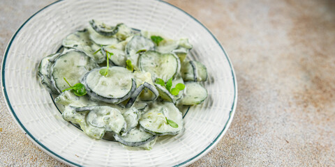 Сucumber salad fresh cream tasty food dish fresh delicious gourmet food background on the table rustic food top view copy space top view keto and paleo diet Vegetarian and vegan food