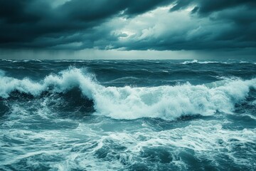 Fototapeta premium Stormy Sea with Large Waves Crashing Under a Dark Cloudy Sky