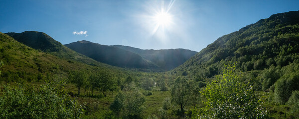 Panoramic view of Glen Nevis valley on a sunny day