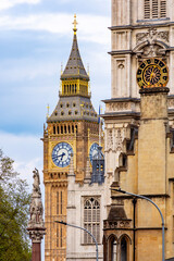 Clocks of Big Ben and Westminster Abbey in London, UK