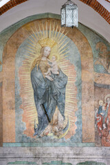 The Virgin Mary with Infant Jesus in Glory. A mural fresco in the Franciscan Friary near the Basilica of St Francis of Assisi in Krak&oacute;w, Poland.