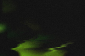 Vintage green motion blur abstract light leak overlay background with a dusty noise grain texture. Grunge style dusty overlay light leak background. Green light overlay, leak flare, light effect