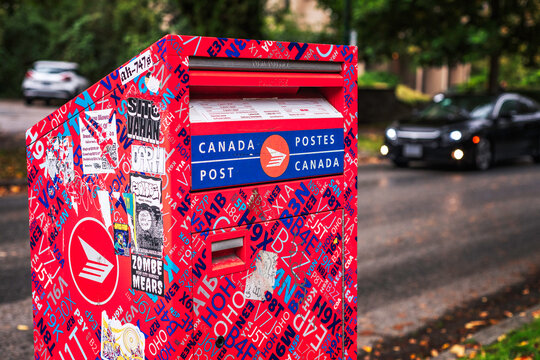 Vancouver, British Columbia, Canada &ndash; September 27, 2024: A Canada post office box on a neighborhood street corner in Vancouver, BC, Canada.