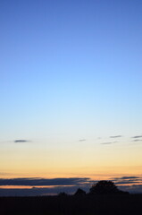 Beautiful sky background - Sunset Sunrise sky with light clouds and real sun
