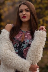 Close up trendy portrait of elegant young woman with big eyes and red lips