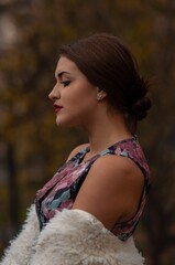 Close up trendy portrait of elegant young woman with big eyes and red lips
