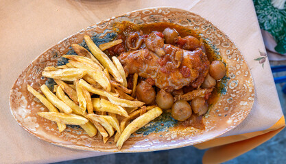 królik duszony z cebulkami,  rabbit stewed with onions