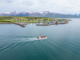 Aerial view of whale watching safari boats near island of Hrisey in north Iceland