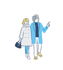 並んで歩いている冬服の若いカップル