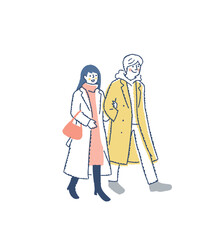 並んで歩いている冬服の若いカップル