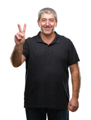 Fototapeta premium Handsome senior man over isolated background smiling with happy face winking at the camera doing victory sign. Number two.
