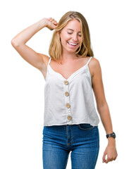 Beautiful young woman over isolated background Dancing happy and cheerful, smiling moving casual and confident listening to music