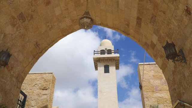 Mosque tower and interior architecture in Jordan, at Cave Of The Seven Sleepers site. Islamic historical sites.