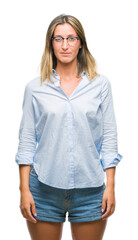 Obraz premium Young beautiful business woman over isolated background with serious expression on face. Simple and natural looking at the camera.