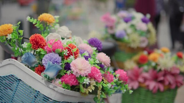 a bunch of flowers on a basket, at garden in Sunny day in Marba Building in Old City Area of Kota Lama. Full of tourist and travel destination in Semarang.