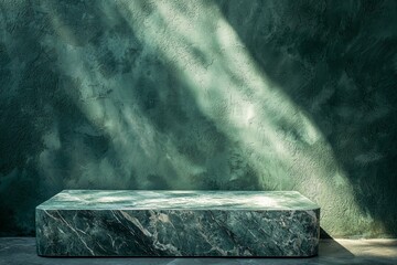 A green marble table with a shadow on the wall behind it