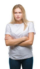 Fototapeta premium Young caucasian woman over isolated background skeptic and nervous, disapproving expression on face with crossed arms. Negative person.