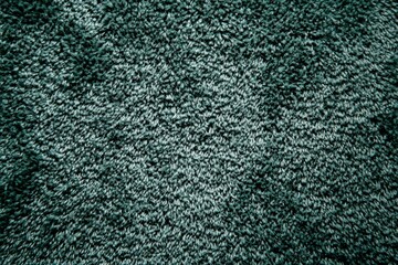 Fototapeta premium A close up of a carpet with a blue and white pattern