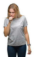 Young caucasian woman over isolated background feeling unwell and coughing as symptom for cold or bronchitis. Healthcare concept.