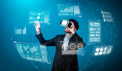 Skilled business man looking data analysis while planning strategy by using visual reality glasses. Professional smart investor checking financial graph holographic while wearing VR goggle. Deviation.