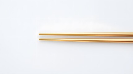 Fototapeta premium Gold Chopsticks isolated on white background. 